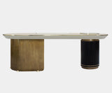 High-end asymmetrical desk with brass and leather elements for a modern office space.