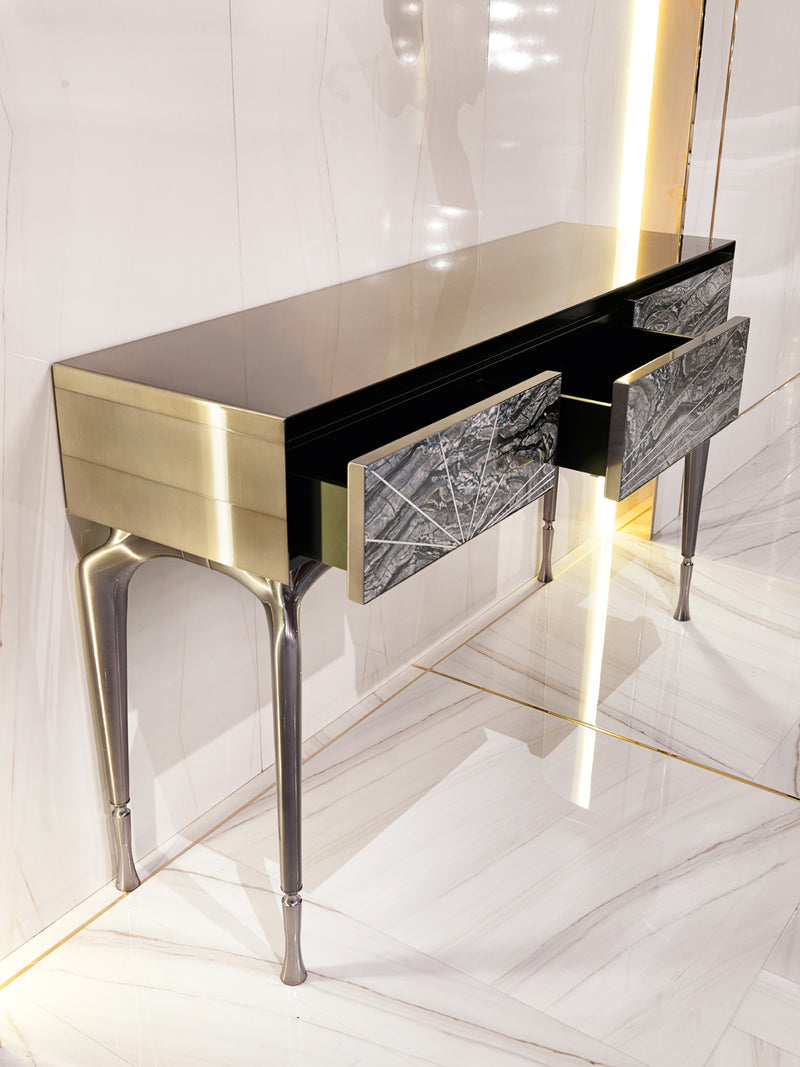 Welcome Guests in Style: The Aurora Console by Visionnaire. This inviting entryway console features three drawers for storage, a mesmerising marble inlay detail, and customisable metal finishes for a touch of personalised luxury.