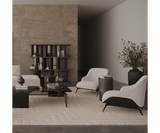 Designer Brigid Armchair in a sophisticated high-end living space.