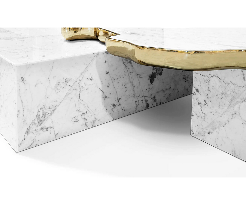 Close-up of the Boca do Lobo Navarra centre table with marble and brass details.