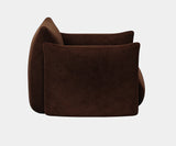 Comfortable and stylish suede armchair, ideal for luxury home decor.