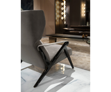 Elegant Imagine Armchair by Mauro Lipparini, a luxury seating option with customizable metal feet and a sleek silhouette.