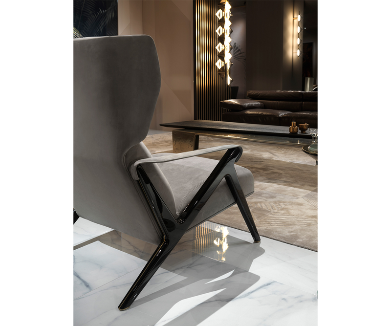 Elegant Imagine Armchair by Mauro Lipparini, a luxury seating option with customizable metal feet and a sleek silhouette.