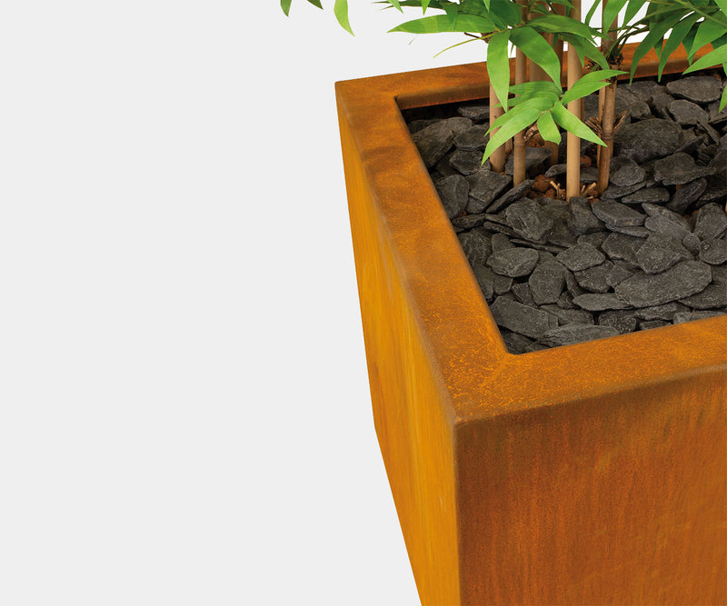 Fleur Ami Corten Steel Plant Cube for stylish modern outdoor planters in luxury gardens.