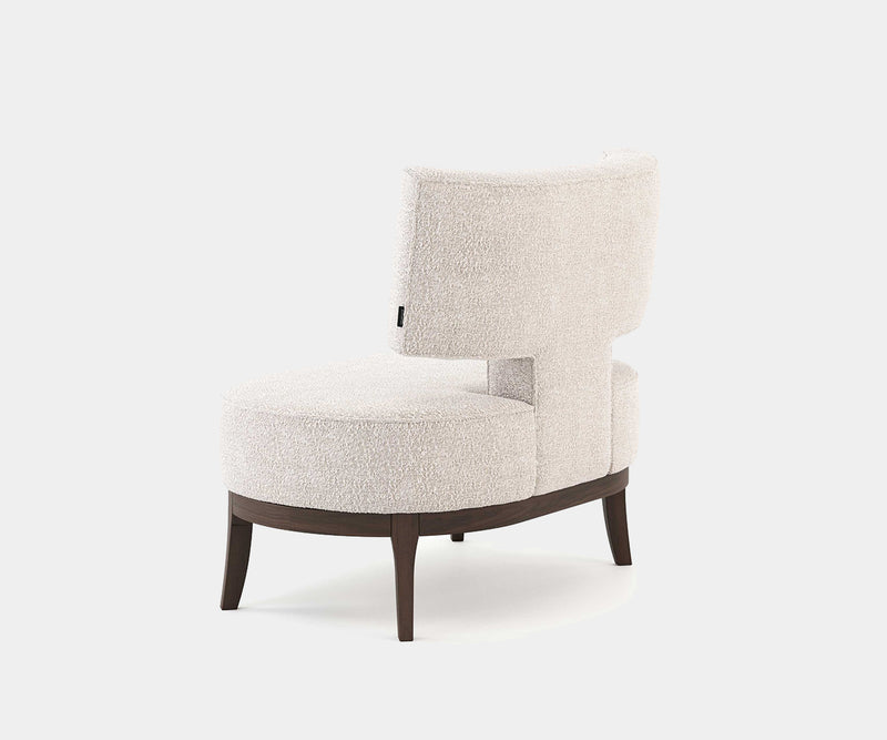 T-Shaped Armchair for High-End Home Decor: The Tonic T Bouclé Armchair adds a touch of luxury with its unique T-shape and soft bouclé fabric.