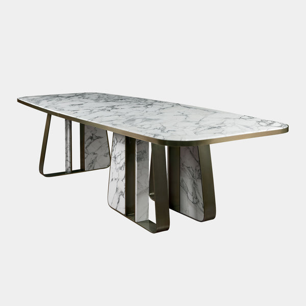 Kenai luxury dining table with Calacatta marble top and brushed brass base, a modern customisable furniture piece by Porus Studio.