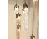 Modern luxury lighting with the Empyrean Chandelier in an elegant home decor setting.