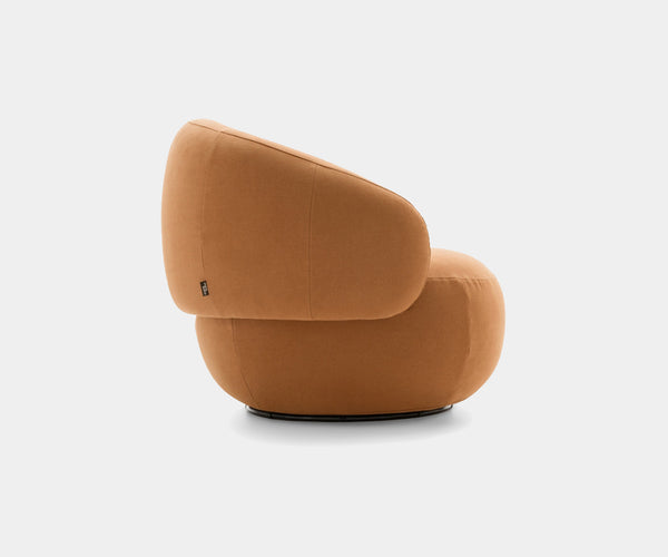 Designed by Daniele Lo Scalzo Moscheri, the Ditre Italia Cookie Armchair features flowing lines and a curved silhouette for a unique organic aesthetic.