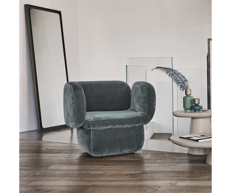 Designed by Nika Zupanc, the Ditre Italia Haring Armchair showcases organic curves and luxury craftsmanship.