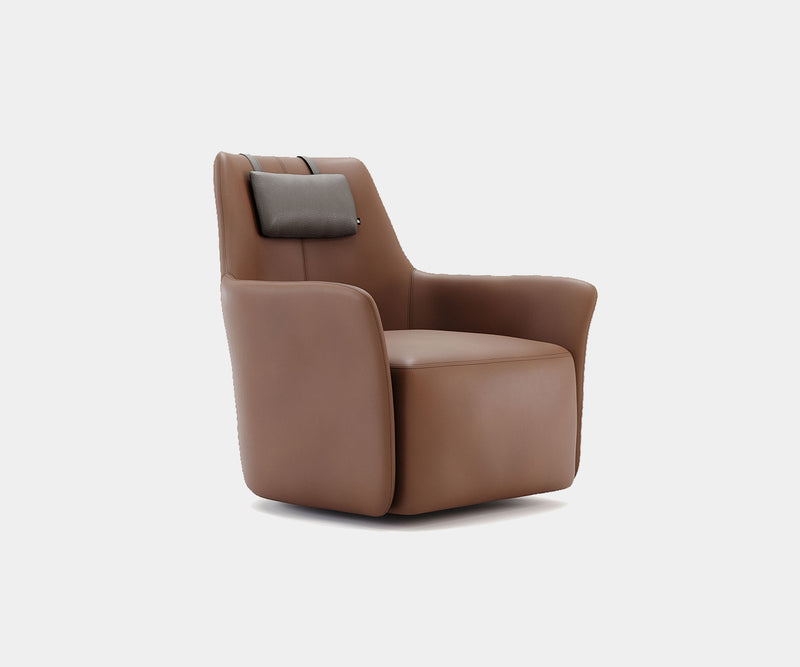 High-End Home Decor: Elevate your living space with the Domkapa Alexander Armchair, a luxurious swivel armchair featuring a timeless wingback design.