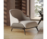 Refined Brigid Armchair showcasing brushed brass details and ergonomic comfort.