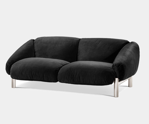 Elegant Flo Sofa by Ghidini 1961 featuring artisanal craftsmanship and Brazilian-inspired aesthetics.