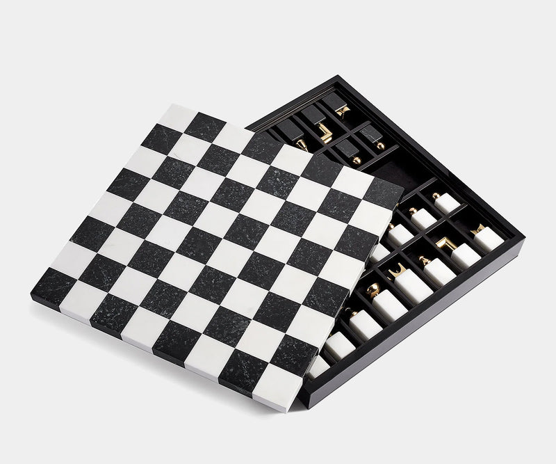 Luxury L'Objet Chess Set made from ebony wood, marble, and brass, perfect for elegant home décor.