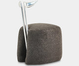 Charcoal bouclé dining chair with a unique silver sand-cast aluminium backrest, offering a touch of luxury to contemporary interiors.