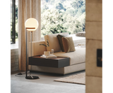 Laskasas Clarke Floor Lamp providing ambient lighting in a chic hallway with contemporary design elements.