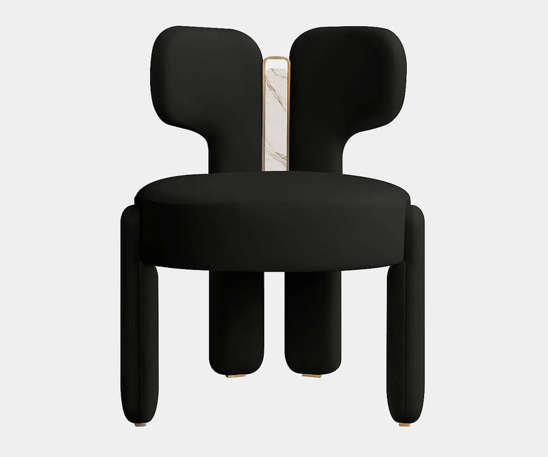 Contemporary dining chair with natural leather and high-end brass accents.