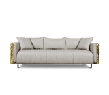 The Imperfectio Sofa by Boca Do Lobo: A celebration of Wabi-Sabi aesthetics. Hand-hammered brass and plush leather create a unique luxury piece.