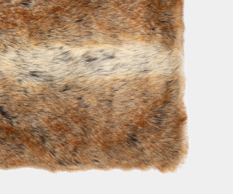 Cosy fireside companion? Look no further than the Husky Faux Fur Throw. This incredibly soft, faux fur throw adds a touch of warmth and style to any fireplace setting.