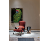 Contemporary Imagine Armchair in luxurious leather, featuring polished wood legs, designed by Mauro Lipparini for refined home decor.