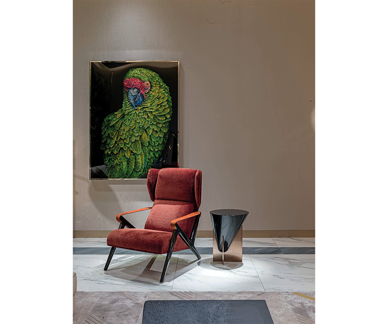 Contemporary Imagine Armchair in luxurious leather, featuring polished wood legs, designed by Mauro Lipparini for refined home decor.