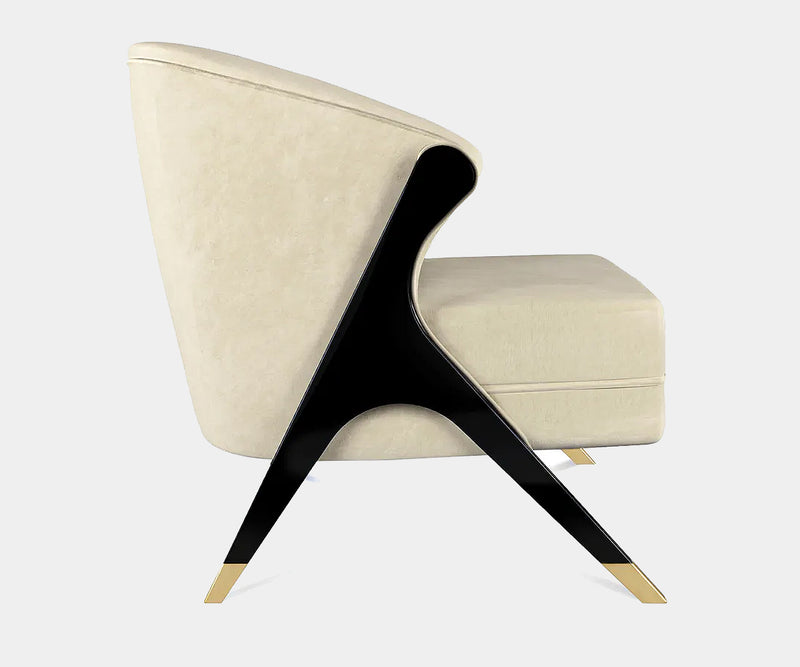 KOKET Naomi chair upholstered in Paris Velvet Cream for luxury interiors.