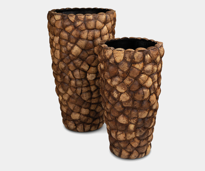 Handcrafted coconut shell floor planters for luxury home decor.