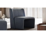 Transform your living room with the Legacy Armchair. This Domkapa design offers a modern aesthetic and comfortable seating.