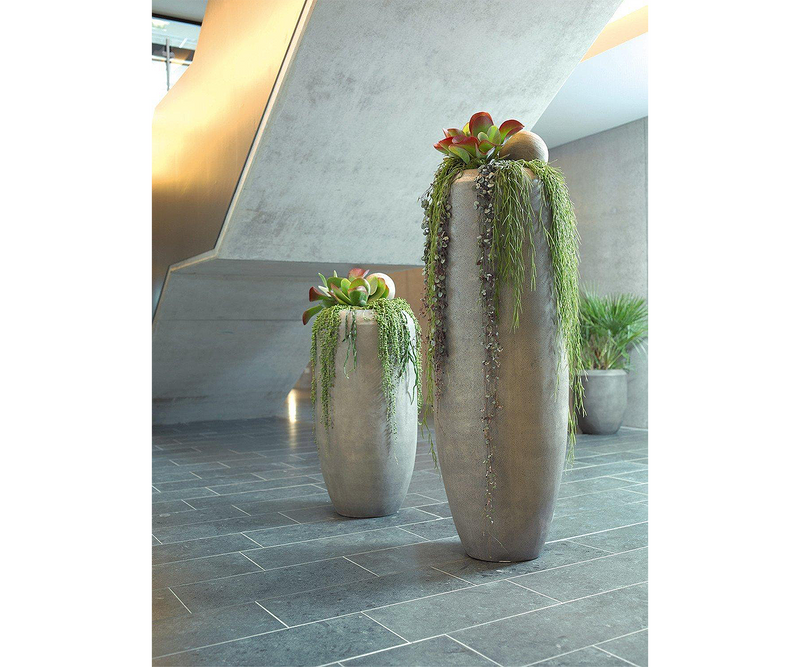 Stylish grey Cigar floor vase suitable for high-end real estate interior design.