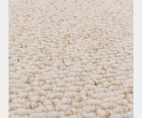 Handcrafted Boden Ivory Rug highlighting high-quality materials and contemporary style.