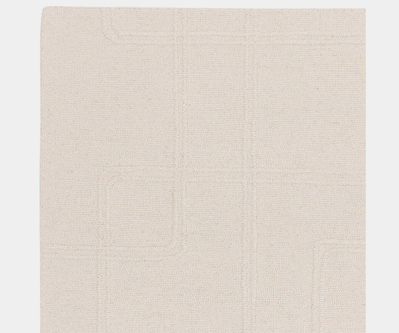 Versatile Ada Ivory rug available in multiple sizes, ideal for various luxury interior styles.