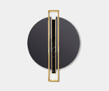 Luxury Shield Mirror with polished brass and Nero Marquina marble in a modern bathroom setting.