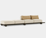 Contemporary sofa featuring oak frame and soft fabric upholstery.