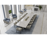 Architectural-inspired dining table with Statuario marble and brass details by Luxxu