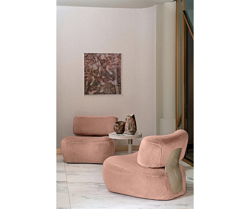 Luxurious comfort meets modern design with the Mira leather armchair.