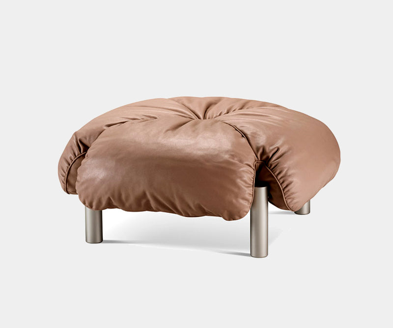 Elegant leather Flo Ottoman by Ghidini 1961 showcasing mid-century modern design.