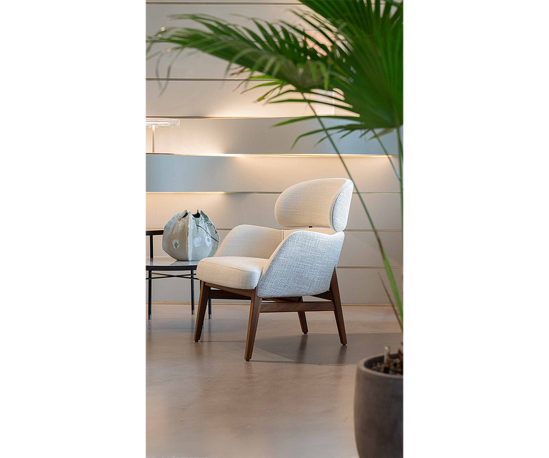 Modern Dafne Armchair in a sleek, contemporary home setting, offering comfort and style.