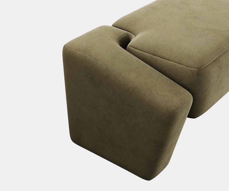 Contemporary suede bench that serves as a statement piece in high-end real estate settings.