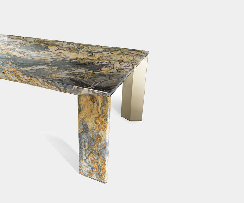 Modern marble dining table with stainless steel accents