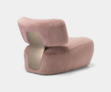 High-end home decor: Mira Armchair, a statement piece for sophisticated interiors.