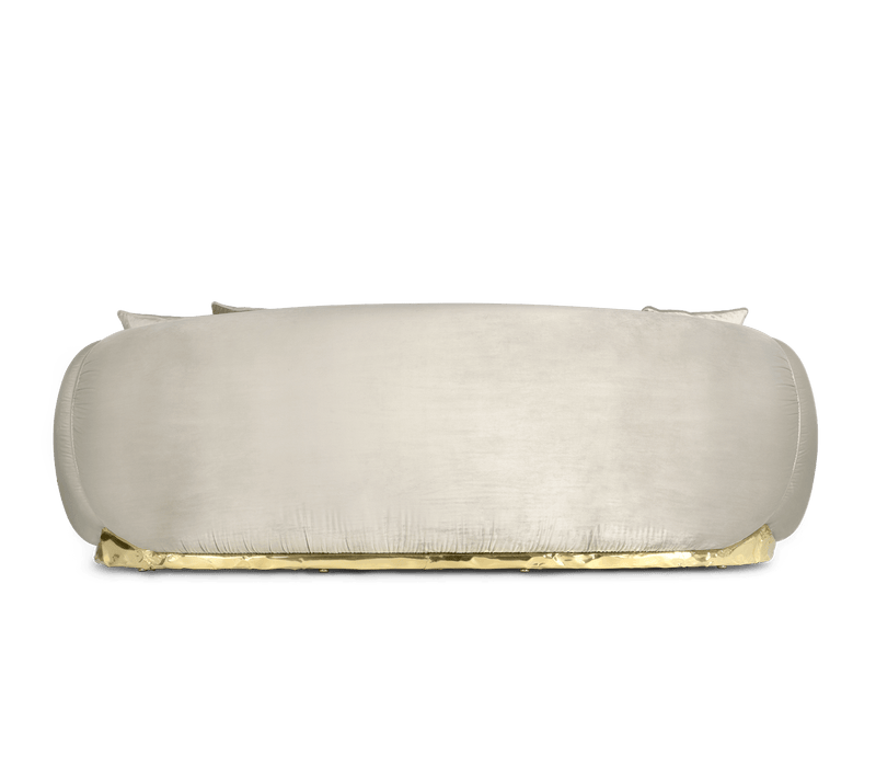 Boca Do Lobo's Soleil Sofa: Polished brass and rich leather showcase the brand's exquisite craftsmanship.