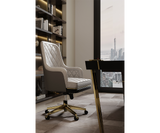 Premium black leather and brass office chair adding elegance to modern workspace.