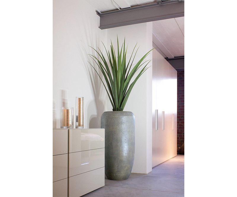 Versatile Cigar floor planter as an elegant statement piece for interior design.