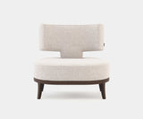 Tonic T Bouclé Armchair in Cream: Modern luxury embraces you in comfort. T-shaped design with soft bouclé fabric and walnut wood veneer legs.