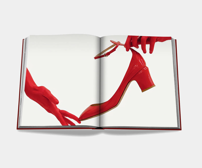 The Evolution of Red Fashion: Valentino from Garavani to Piccioli - Explore the evolution of Valentino's red aesthetic through this coffee table book.