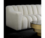 Create a luxurious haven in your home with the Nuvola Sofa. Features a modern design and a cascade sand finish.