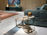 Invest in Timeless Design with the Button Coffee Table: The Visionnaire Button Coffee Table is more than just furniture; it's an investment in timeless design. This captivating creation boasts a hand-polished marble top, a curved stainless steel base, and a unique "up-side-down half bullnose" edge, ensuring it remains a focal point for years to come.