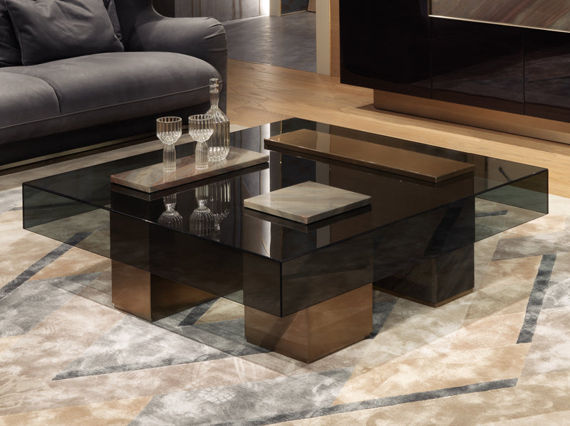 Modern Coffee Table with Smoked Crystal Top: The Visionnaire Marty Coffee Table features a sleek and sophisticated smoked crystal top, 8mm thick and secured with UV bonding. This modern design allows the beauty of the sculptural base to shine through.