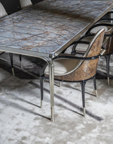 Inlaid Marble Dining Table: The Thule by Visionnaire showcases the beauty of Marquina Black marble with its dramatic veining.