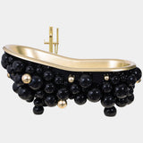 Luxury Newton Bathtub with gold-painted cast iron and high-gloss black lacquered spheres, designed by Maison Valentina.